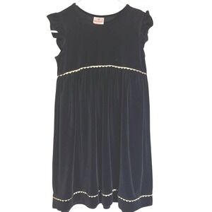 Hanna Andersson Black and Gold Ruffle Dress. ‎ Gold trim has sparkle. Size 150.